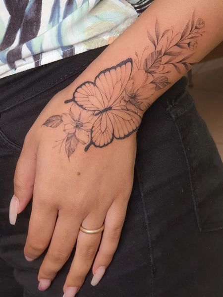 Feminine Wrist Tattoo