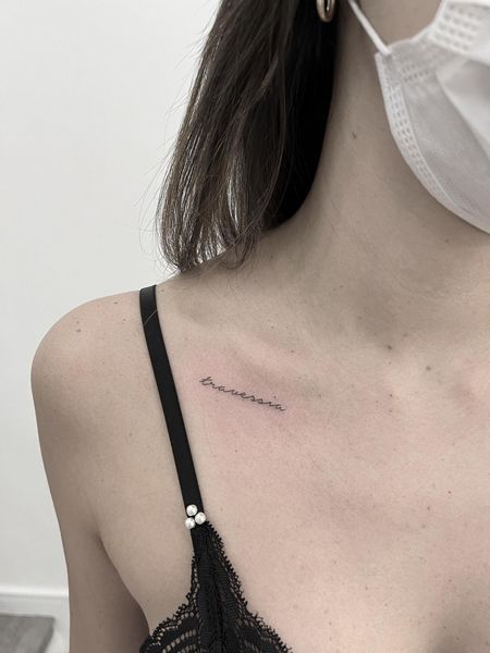 Fine Line Collarbone Tattoo