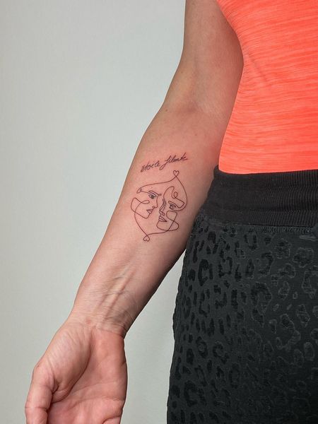 Fine Line Face Tattoo