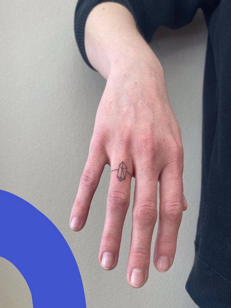 Fine Line Ring Tattoo