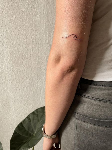 Fine Line Wave Tattoo