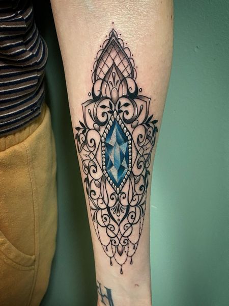 Gem Forearm Tattoo