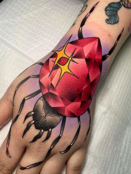 Gem Hand Tattoo