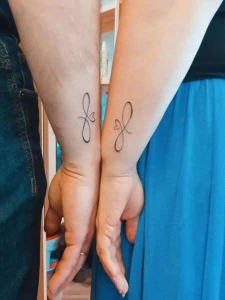 Matching Couple Infinity Tattoo