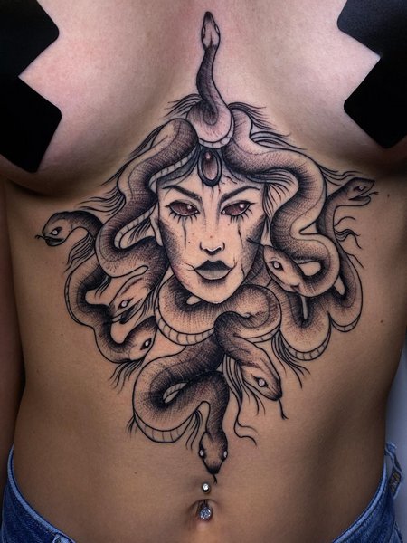 Medusa Sternum Tattoo