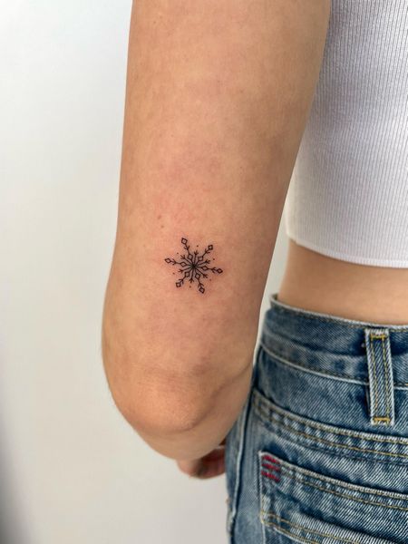 Minimalist Snowflake Tattoo