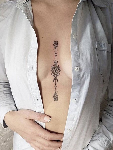 Minimalist Sternum Tattoo