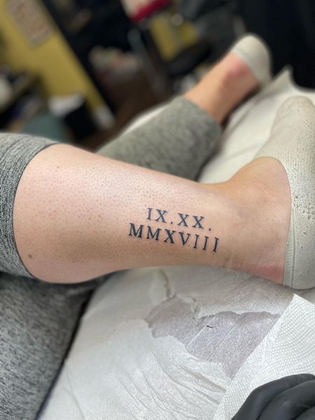 Roman Numeral Ankle Tattoo