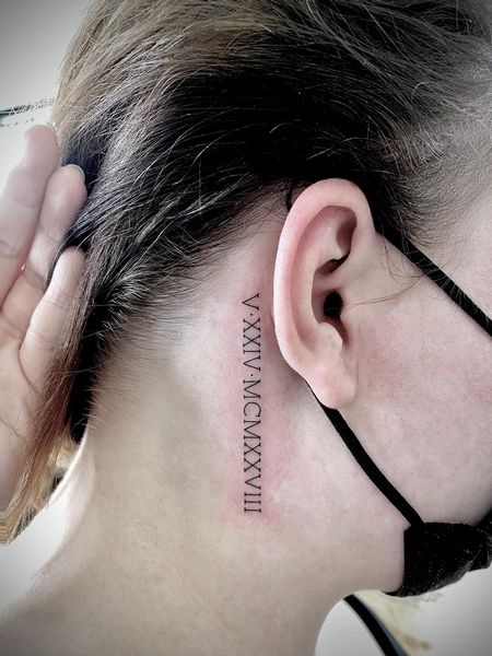 Roman Numeral Neck Tattoo