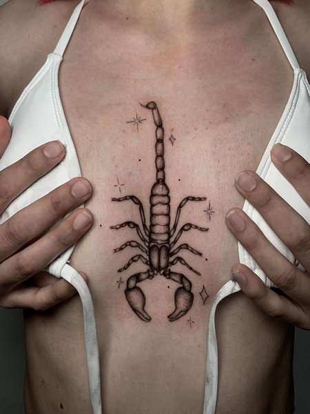 Scorpion Tattoo On Sternum