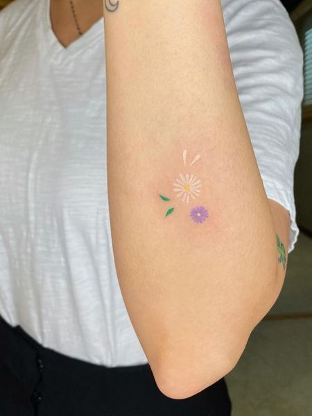 Small White Flower Tattoo