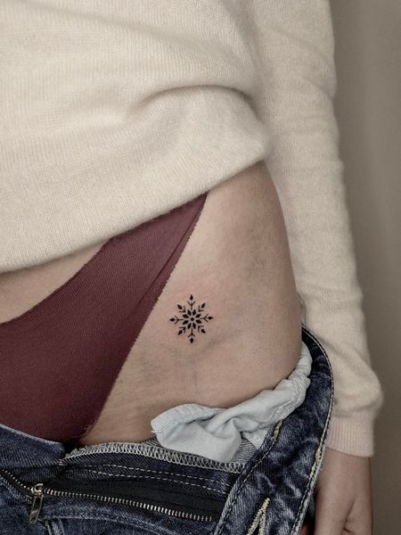 Snowflake Hip Tattoo