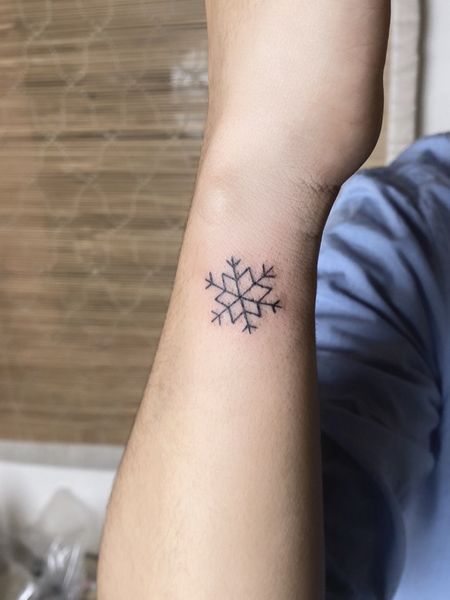 Snowflake Wrist Tattoo