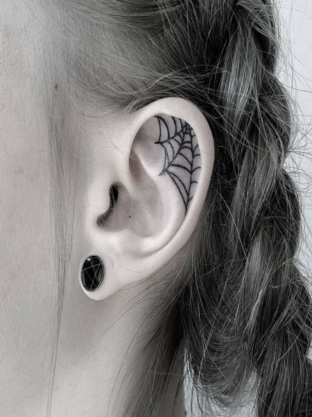 Spider Web Tattoo On The Ear