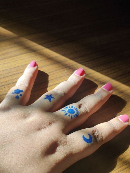 Sun and Moon Finger Tattoo