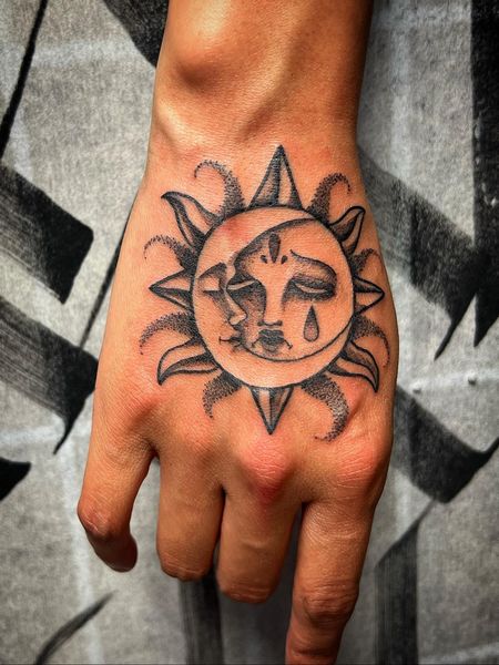 Sun and Moon Hand Tattoo