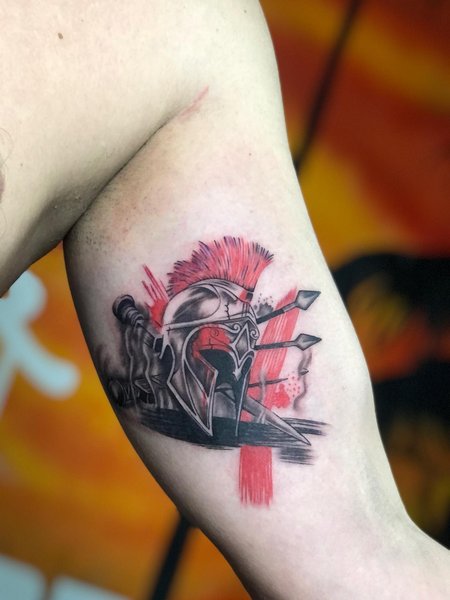 Trash Polka Spartan Bicep Tattoo