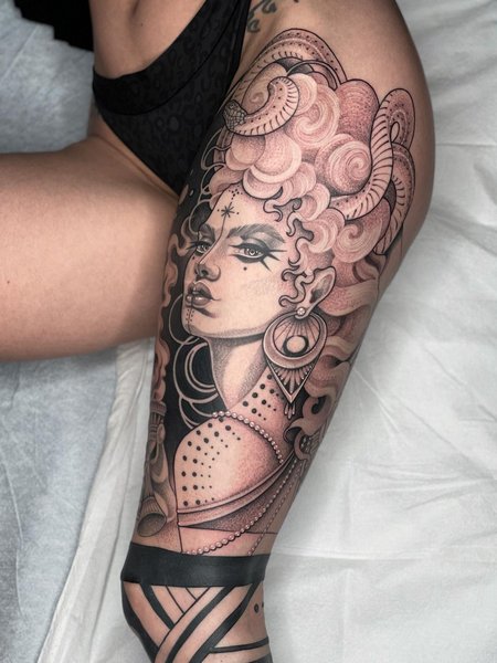 Tribal Medusa Thigh Tattoo