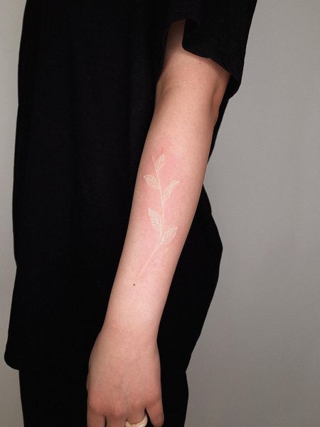 White Arm Tattoo