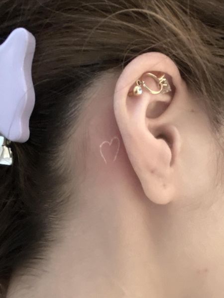 White Behind The Ear Tattoo