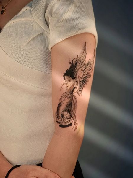 female angel tattoo