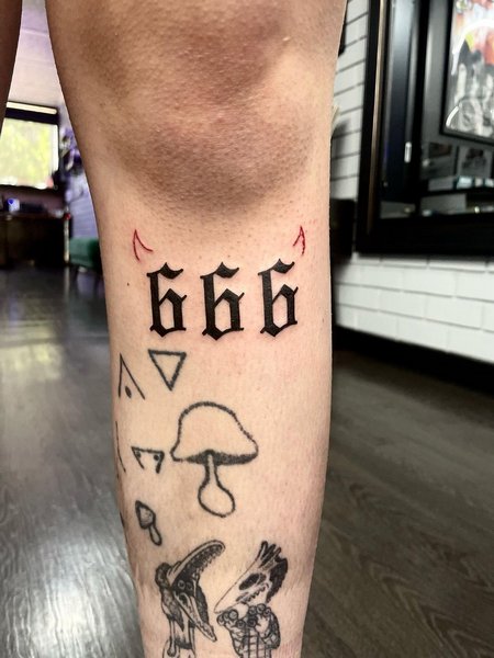 666 Tattoo On Leg