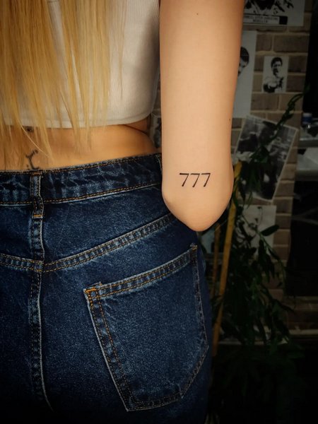 777 Tattoo On Arm
