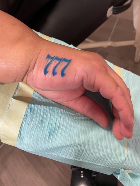 777 Tattoo On Hand