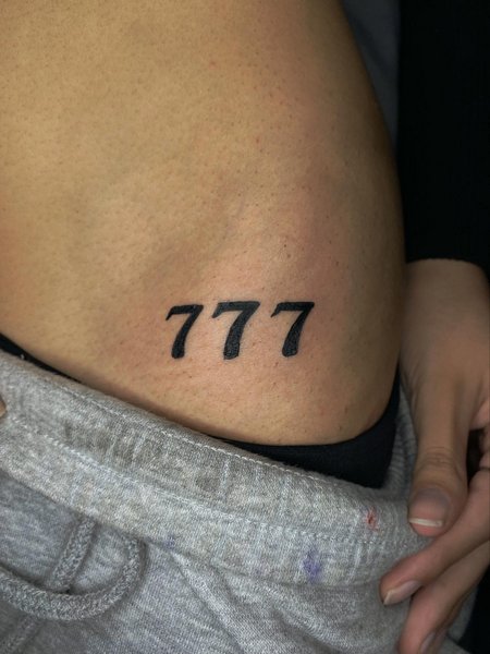 777 Tattoo On Hip