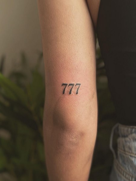 Arm 777 Tattoo