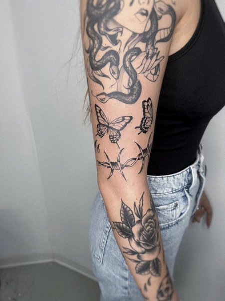Barb Wire Sleeve Tattoo