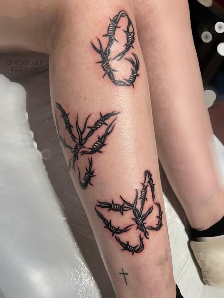 Barbed Wire Butterfly Tattoo
