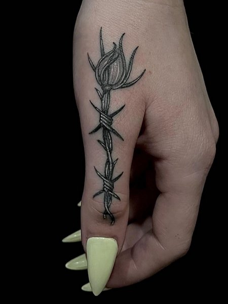 Barbed Wire Finger Tattoo