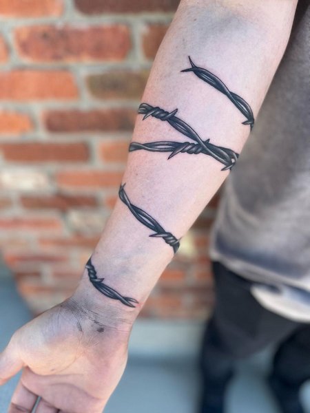 Barbed Wire Forearm Tattoo