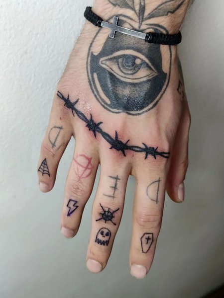 Barbed Wire Hand Tattoo