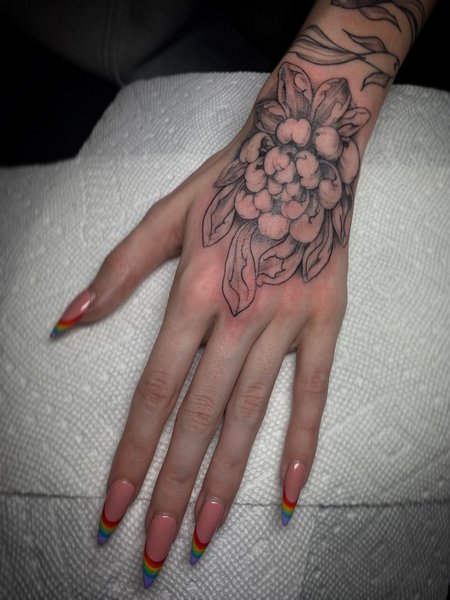 Chrysanthemum Hand Tattoo