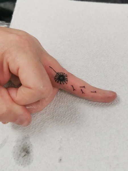 Dandelion Finger Tattoo