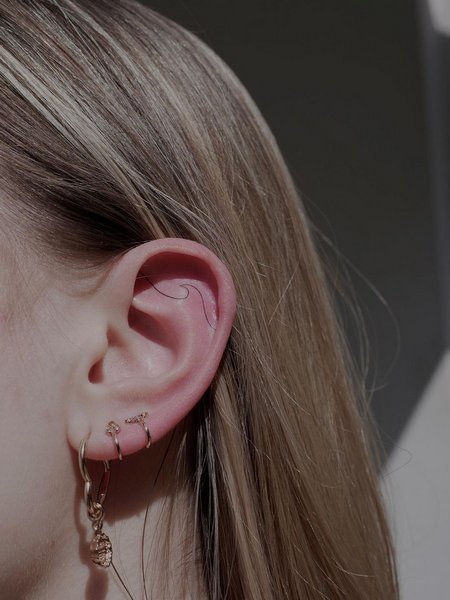 Ear Wave Tattoo