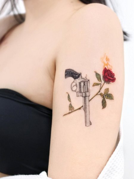 Feminine Gun Tattoo
