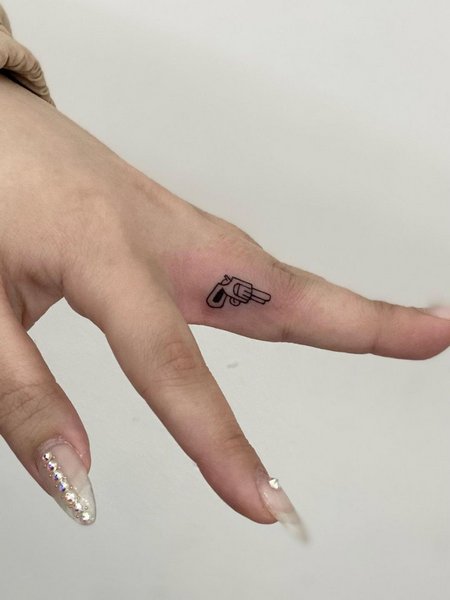 Finger Gun Tattoo