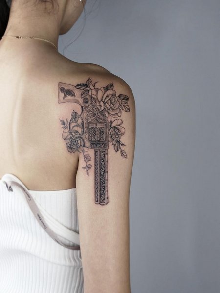 Flower Gun Tattoo