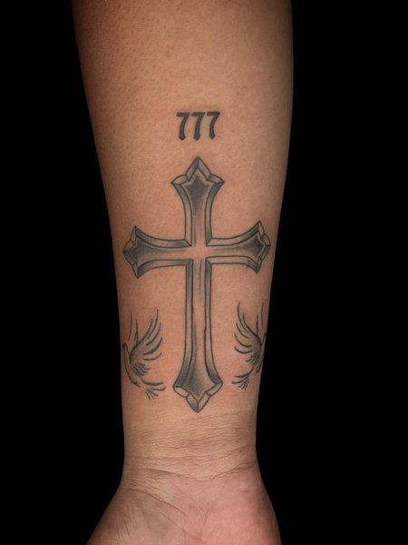 Forearm 777 Tattoo