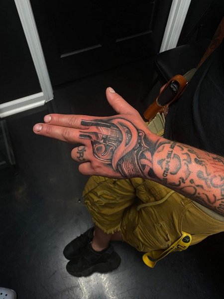 Gun Tattoo On Hand