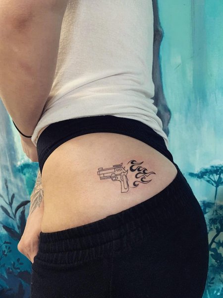 Gun Tattoo On Hip