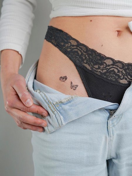 Hip Bone Tattoos