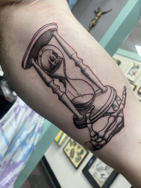 Hourglass Tattoo On Biceps