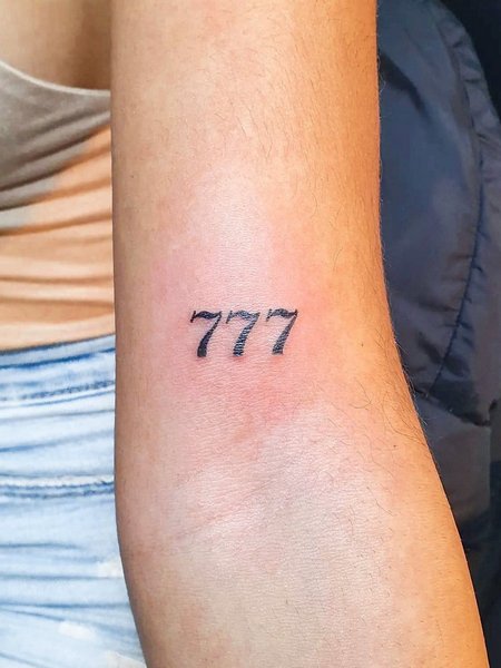 Meningful 777 Tattoo