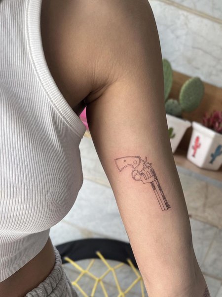 Minimalist Gun Tattoo