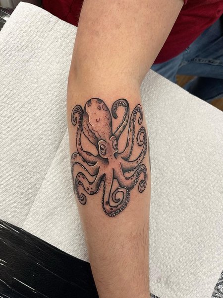 Minimalist Octopus Tattoo