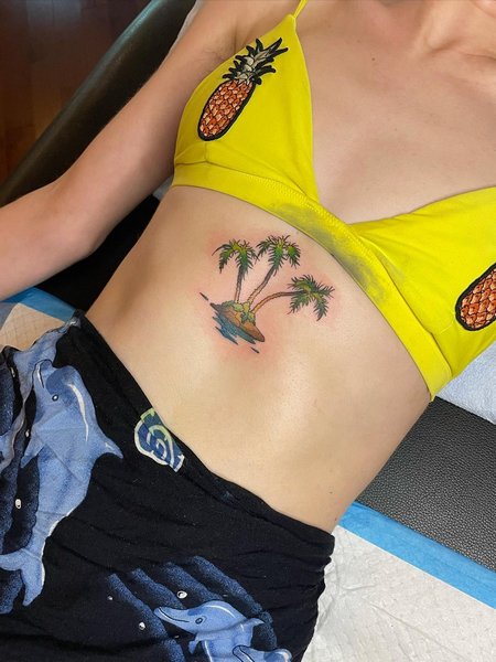 Palm Tree Tattoo On Sternum